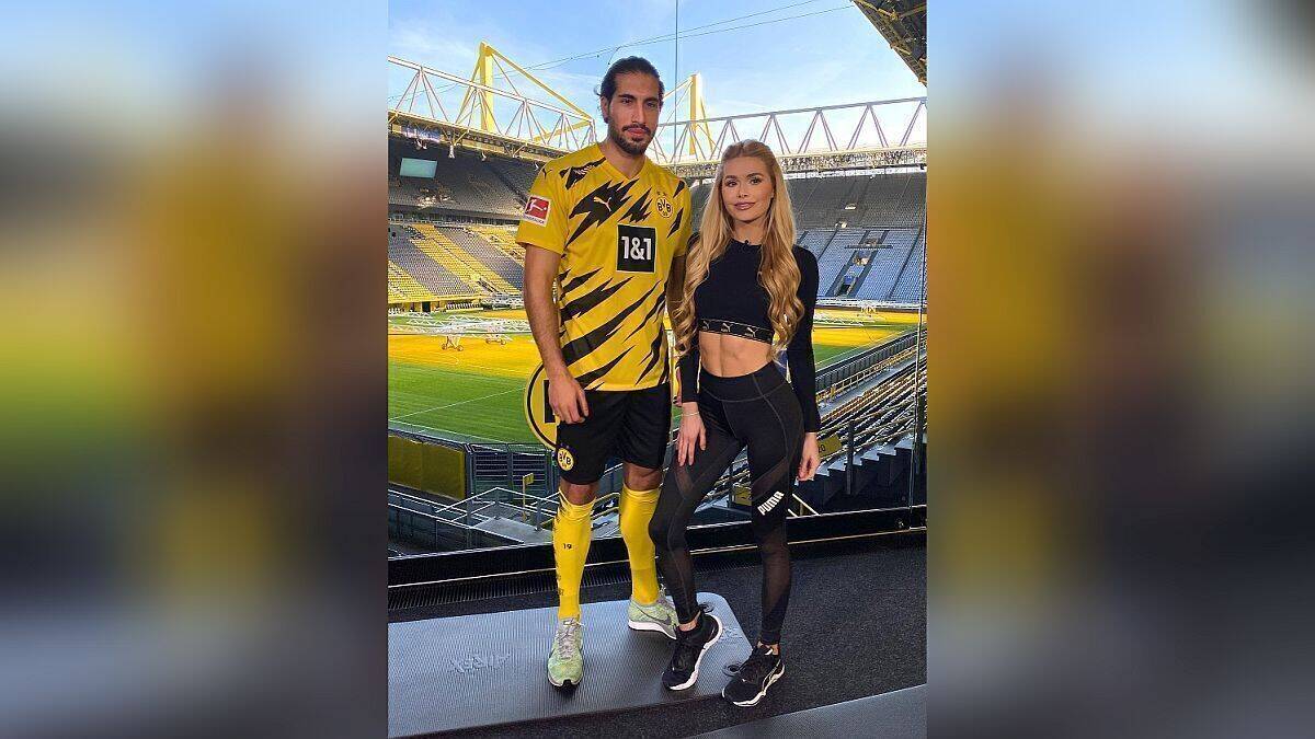 Borussia Dortmunds Mittelfeldstar Emre Can trainiert zusammen mit Pamela Reif.