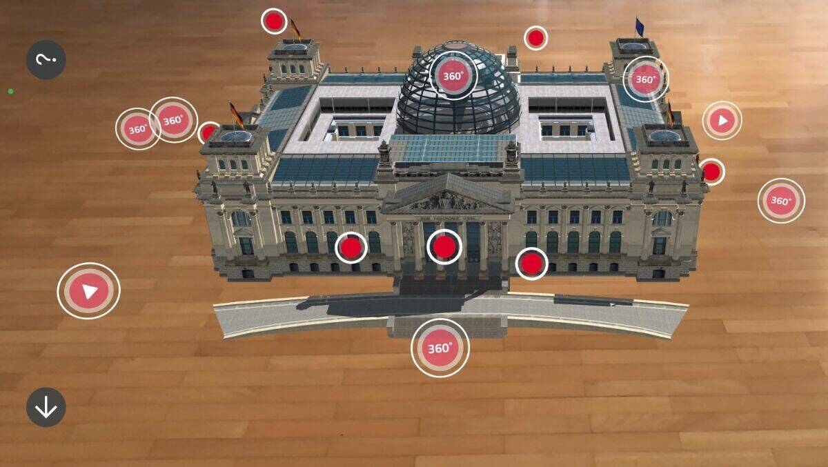 Per Knopfdruck steht der Reichstag auf dem Parkett.